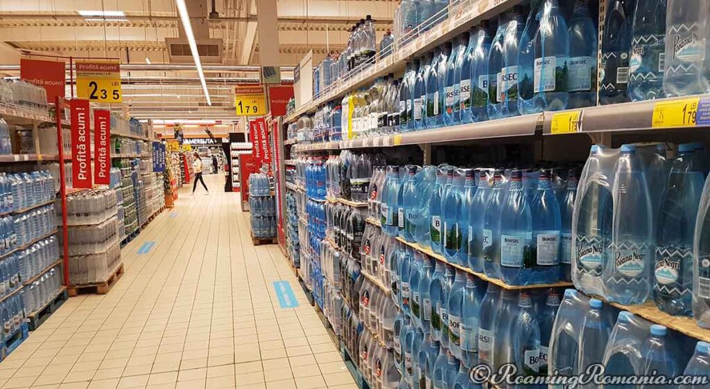 Store Shelves in Romania are full of Mineral Water